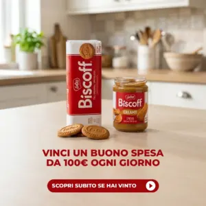 Confezione di biscotti Lotus Biscoff e vasetto di crema spalmabile Biscoff Creamy su un bancone di cucina, con il testo Vinci un buono spesa da 100 euro ogni giorno